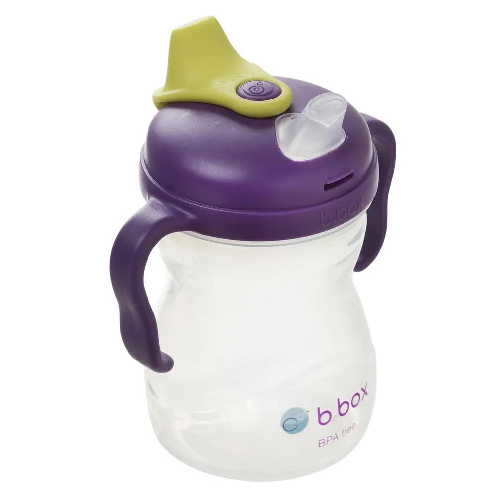 B.Box Spout Cup with purple lid and lime spout; BPA-free, easy-grip handles for toddlers.