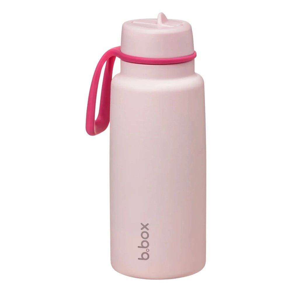 B.box Insulated Flip Top 1L water bottle in pastel pink, carried by a pink strap with a flip-top lid.