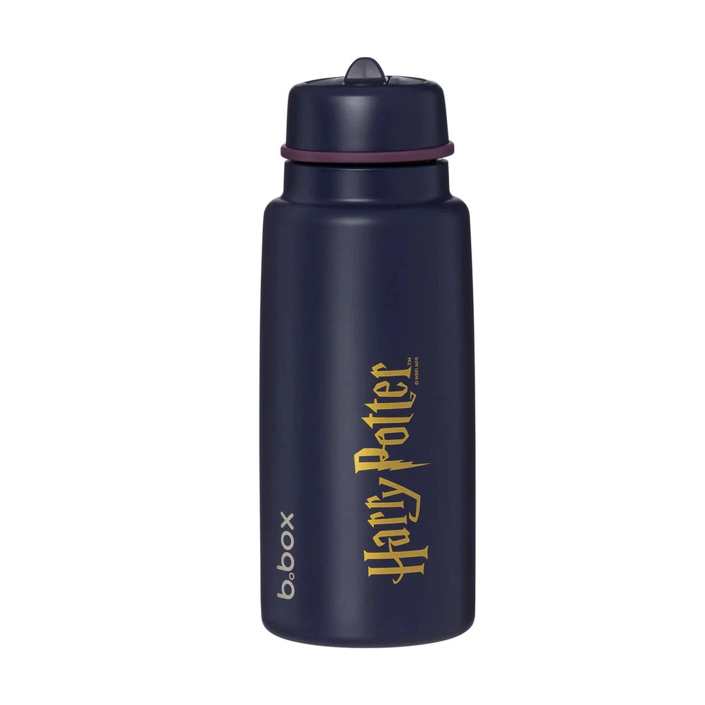 B.box Insulated Flip Top 1L water bottle in navy with gold Harry Potter branding, lid flipped open for sipping.