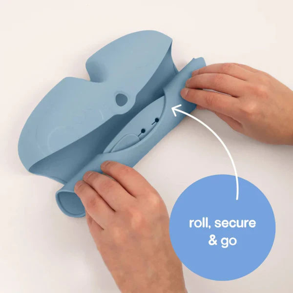 B.BOX Silicone Bib, blue silicone feeding bib with roll-and-secure fastener for quick, mess-free mealtimes.