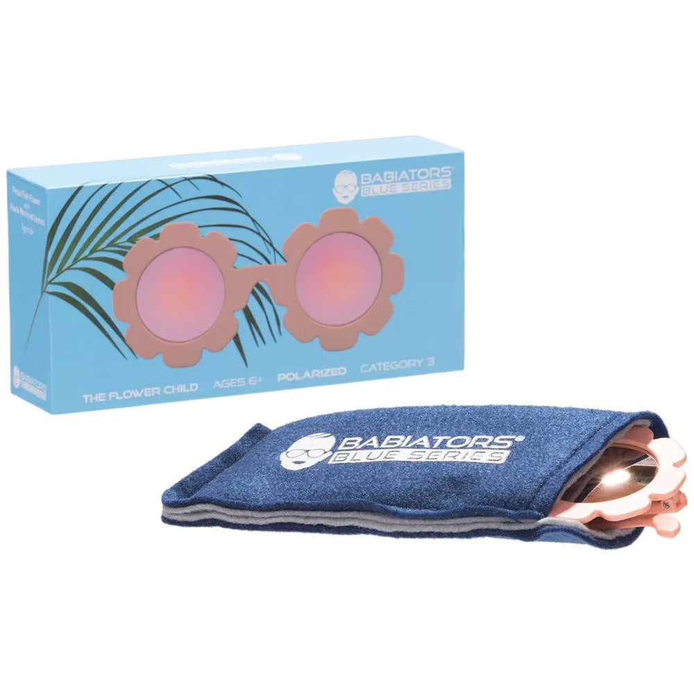 Babiators Flowers Shape Polarized Sunglasses Peachy Pink, shown with a blue box and logoed denim sleeve.