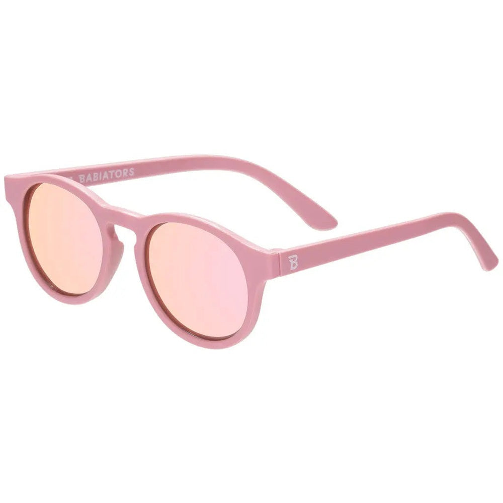 Babiators Polarized Mirrored Sunglasses Pretty In Pink for kids, pink keyhole frames with mirrored lenses.