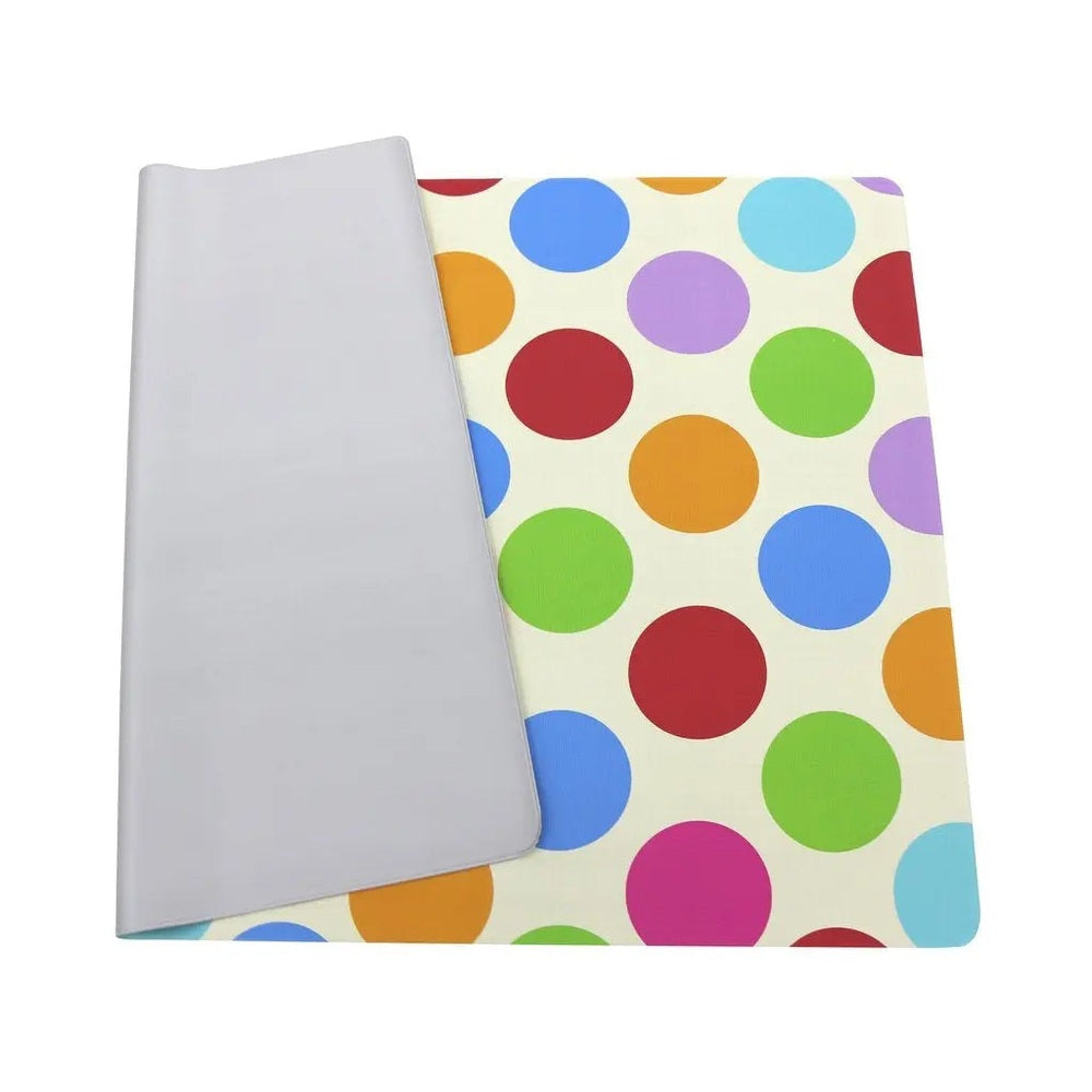 Baby Care Multi Mat, colorful polka-dot top on cream with a gray reversible underside shown folded back.