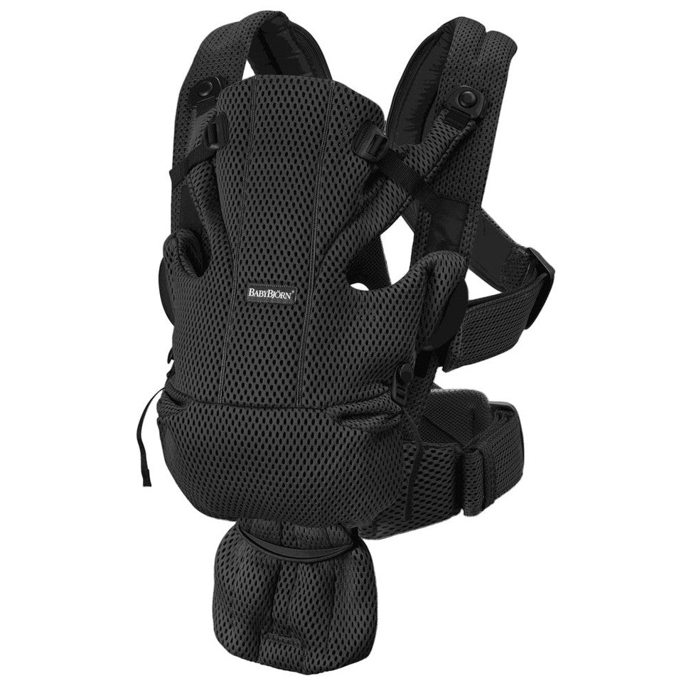 BabyBjörn Baby Carrier Free in black mesh, worn by a parent to show breathable padding and padded straps with waist belt.