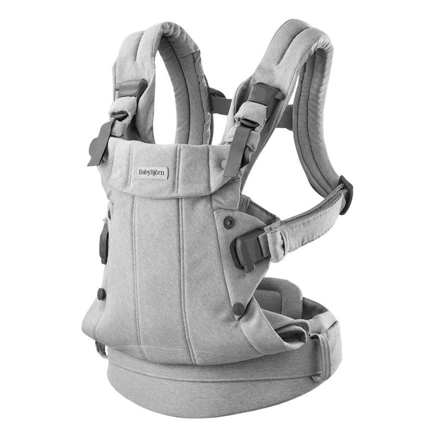 BabyBjörn Baby Carrier Harmony in gray, padded straps buckled and waist belt secured for ergonomic front carry.