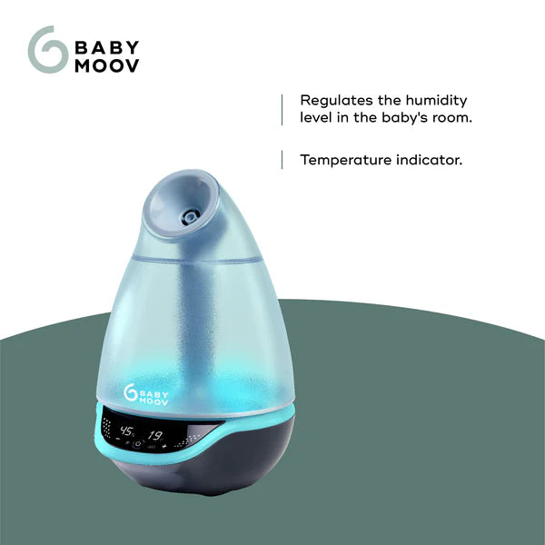 Babymoov Hygro Plus 3-In-1 Baby Humidifier glowing blue with digital display showing humidity and temp.