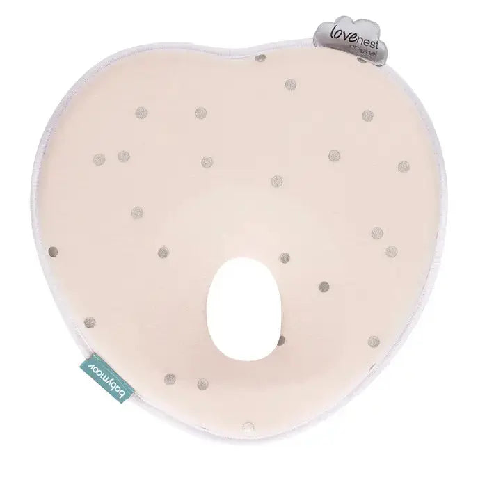 Babymoov Lovenest Pillow beige neck support with silver polka dots, showing the neck cutout.