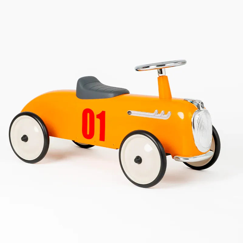 Baghera Ride-On Roaster Camel orange toy car with gray seat and chrome steering wheel, 01 decal.