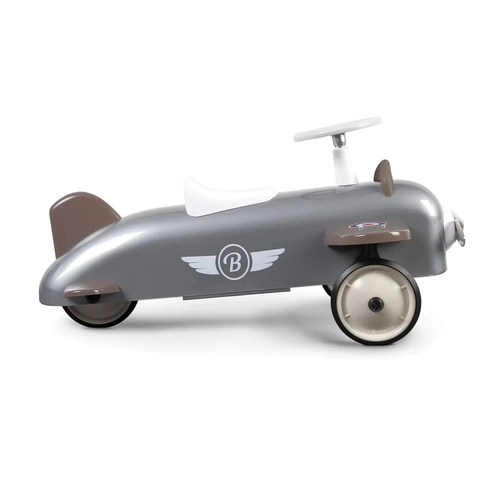 Baghera Ride-On Speedster Plane in silver with white seat and handlebars, logoed wings, riding toy.