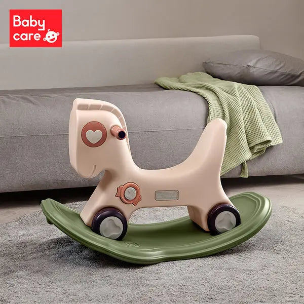 BC Babycare 2-In-1 Rocking Horse toy with beige body sits on a green curved rocker.