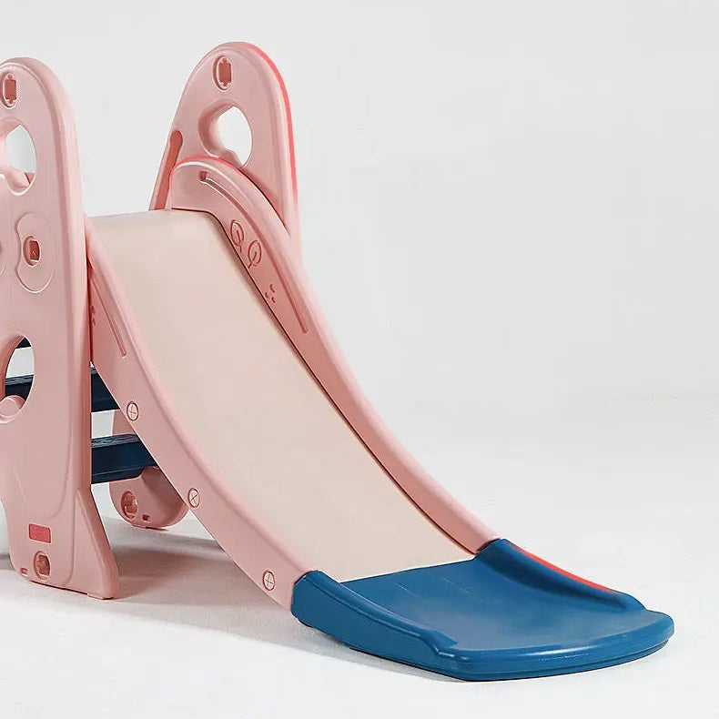BC Babycare 5 In 1 Slide pink outdoor playset with blue sliding surface for kids sliding down.