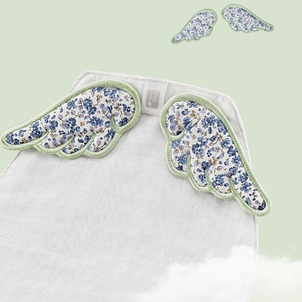 BC Babycare Baby Gauze with blue floral wing patches attached to a soft white cloth, soothing for babies.