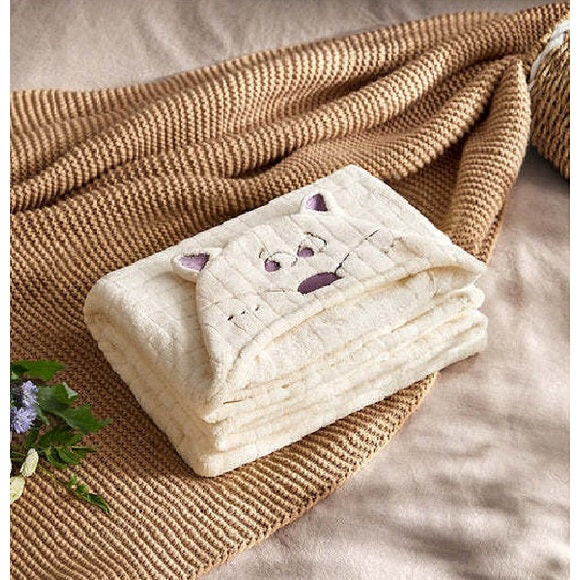 BC Babycare baby hooded bath towel, white plush with an animal-face hood and purple ears.