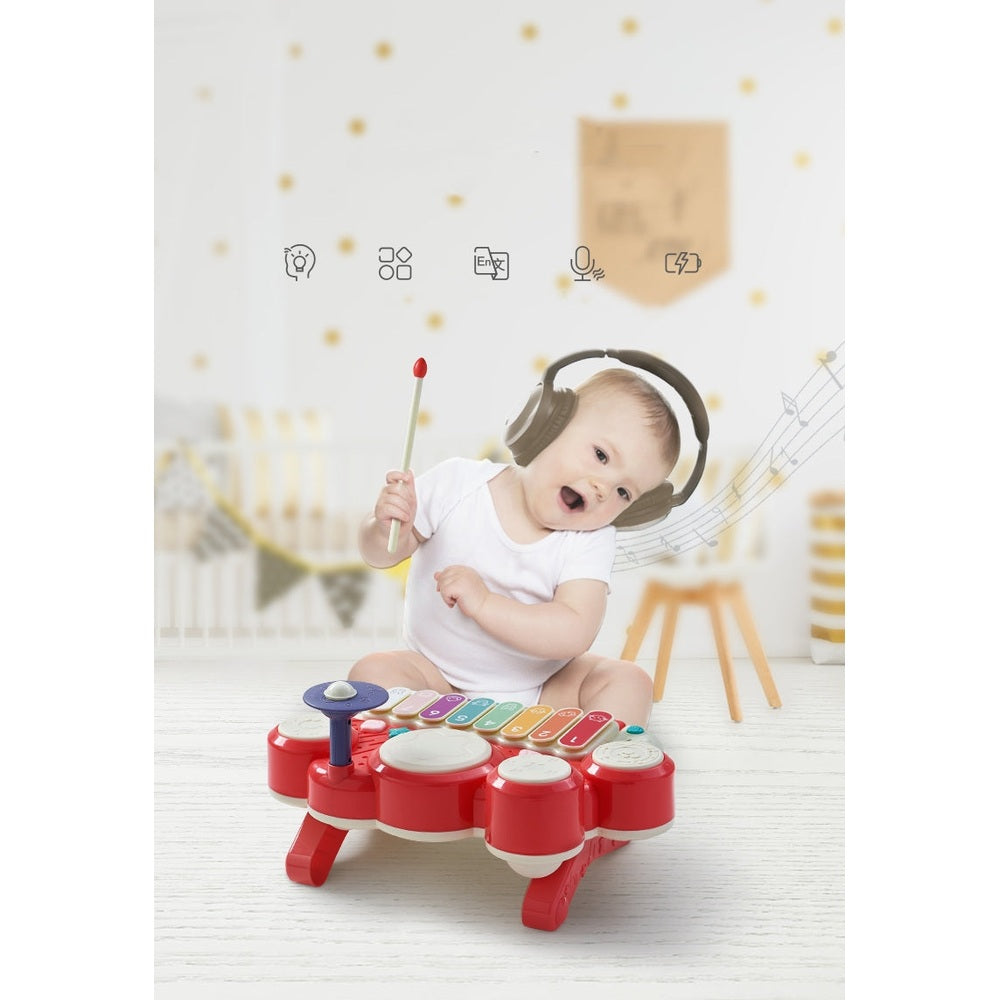 BC Babycare Baby Piano Drum toy with red base and rainbow keys; baby wearing headphones.