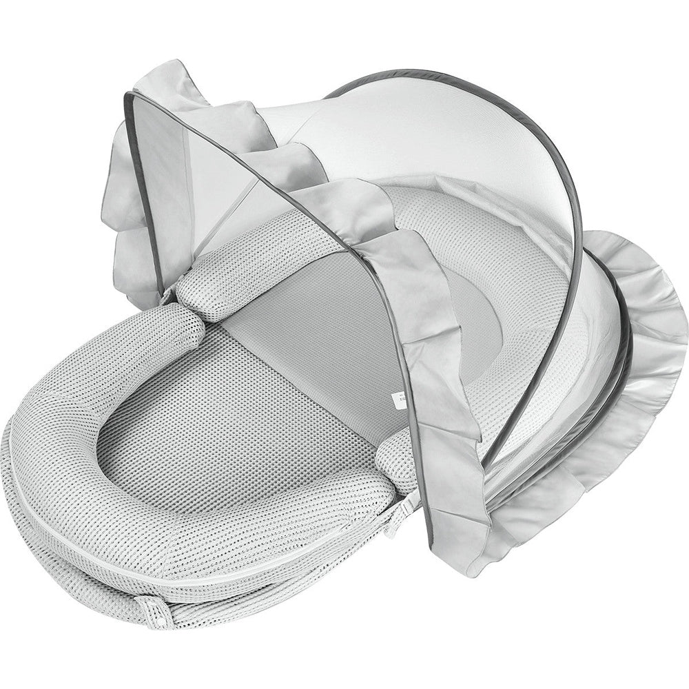 BC Babycare Baby Snuggle Nest in gray with cushioned sides, breathable mesh, and protective canopy