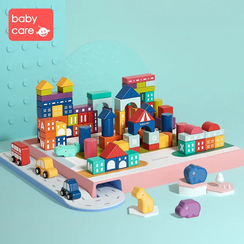 BC Babycare Building Blocks set: vibrant wooden blocks build a colorful toy town with cars on a road base.