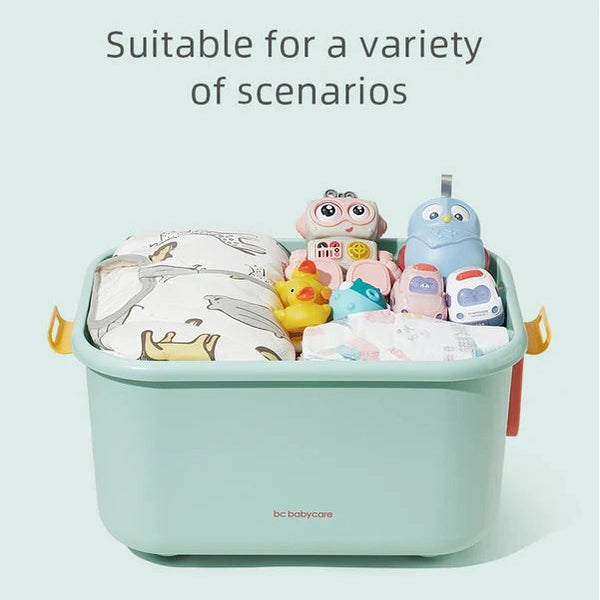 BC Babycare Building Blocks Storage Box in mint green with yellow handles, filled with assorted toys