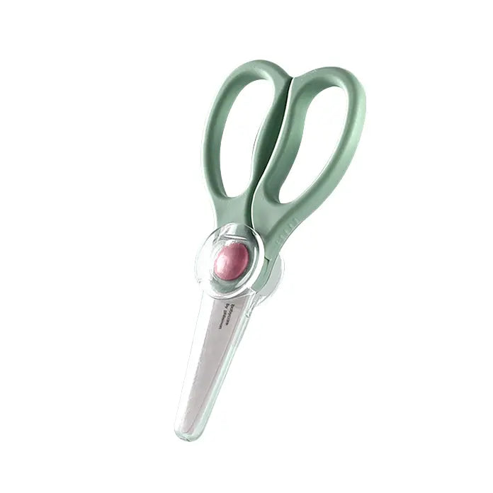 BC Babycare Ceramic Scissors for Babies with teal ergonomic handles and blade guard protecting the blades.