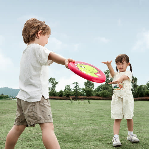 BC Babycare Children Soft Frisbee pink with green center; two kids playing catch on grass.