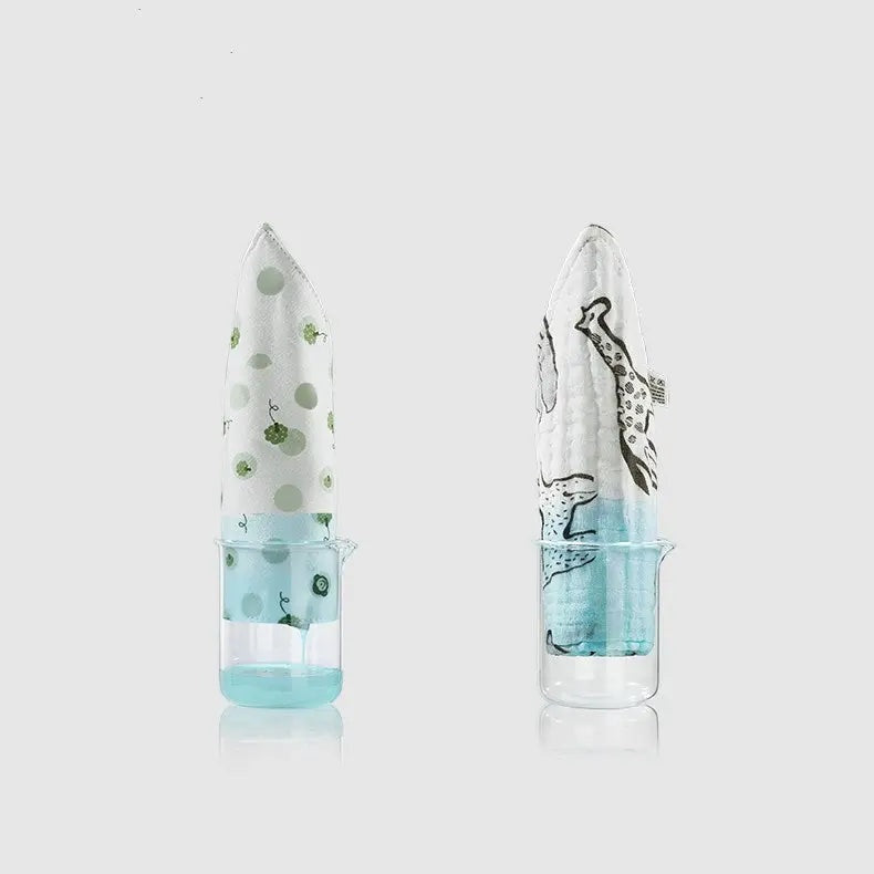 BC Babycare Cotton Flower Shaped Bibs, 3Pcs, white-green polka with blue accents, shown standing upright in clear cups.