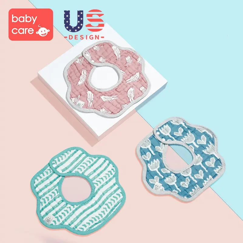 BC Babycare Cotton Flower Shaped Bibs 3Pcs—pink, teal, blue, laid flat with soft trim for mealtime.