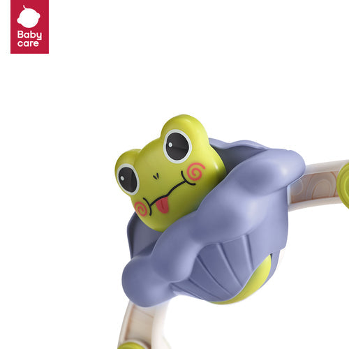 BC Babycare Crib & Stroller Activity Bar with a green frog toy on a purple clip.