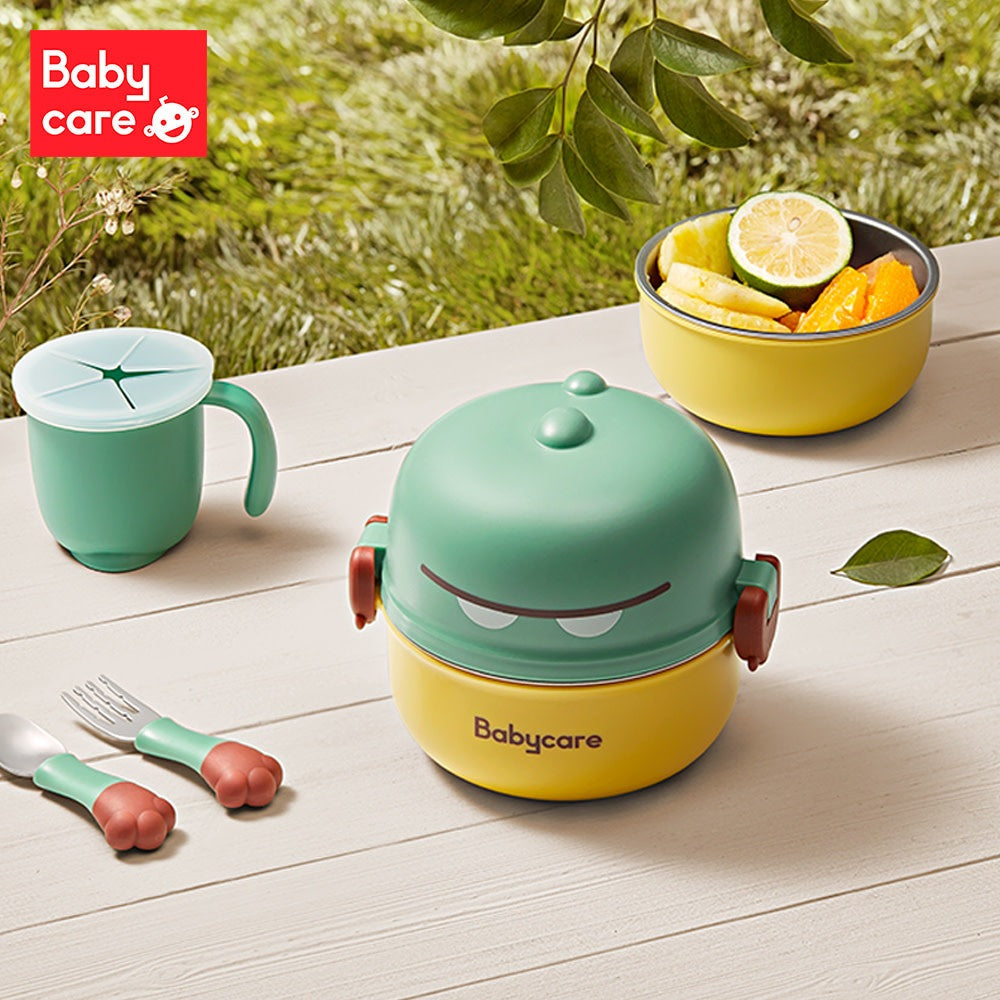 Bc Babycare Dino portable tableware set with green lid, yellow base, red handles, and mint cup