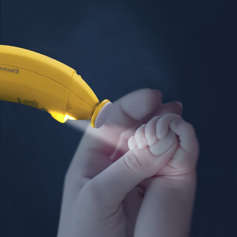 BC Babycare electric nail trimmer polisher in yellow trimming a baby’s fingernail