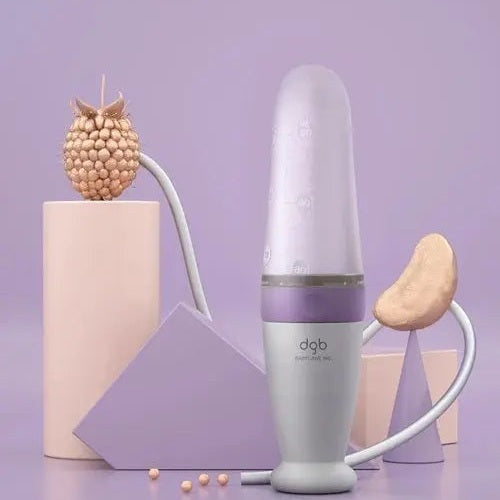 BC Babycare Feeding Spoon Dispenser in pastel lavender and gray with an attached spoon ready to feed.