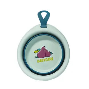 BC Babycare Foldable Baby Washbasin, circular light blue-green basin hanging by a blue loop with centered logo.