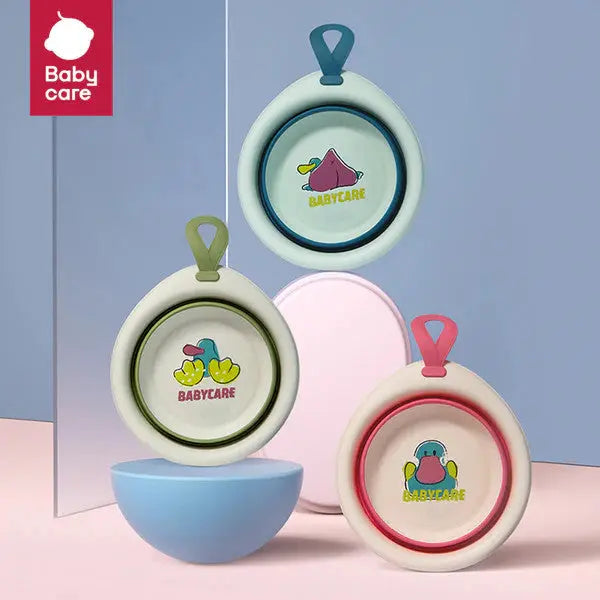 Bc Babycare Foldable Baby Washbasin set of 3 in blue, green and pink, each with a hanging loop.