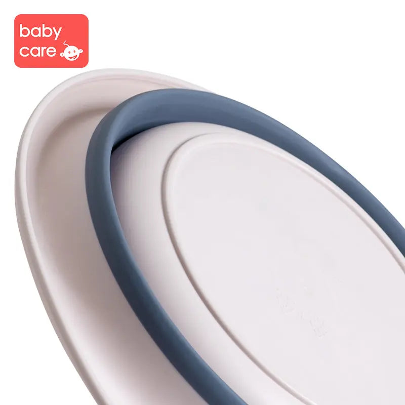 BC Babycare Foldable Baby Washbasin with blue silicone rim and white body, compact design