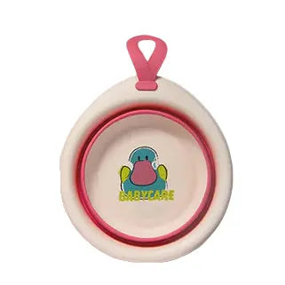 Bc Babycare Foldable Baby Washbasin with pink rim and cream body, pink hanging loop indicates portable use.