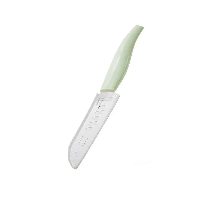 BC Babycare Food Ceramic Knife L with pale green handle slicing soft food for baby feeding.