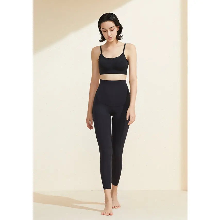 BC Babycare Free Cutting Maternity Pants black full-length leggings, model stands showing high-waisted, comfortable maternity fit.