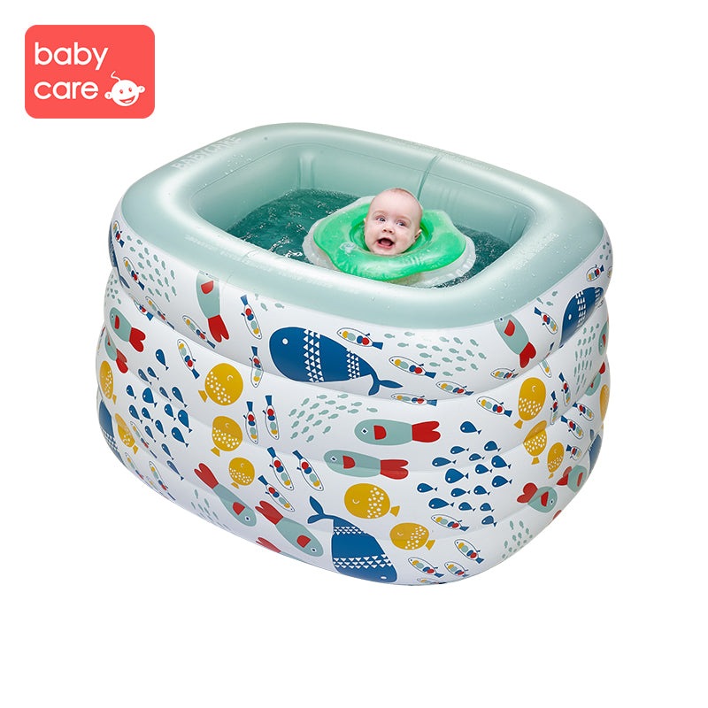 BC Babycare inflatable swimming pool with E-pump, teal rim, and colorful sea life print.