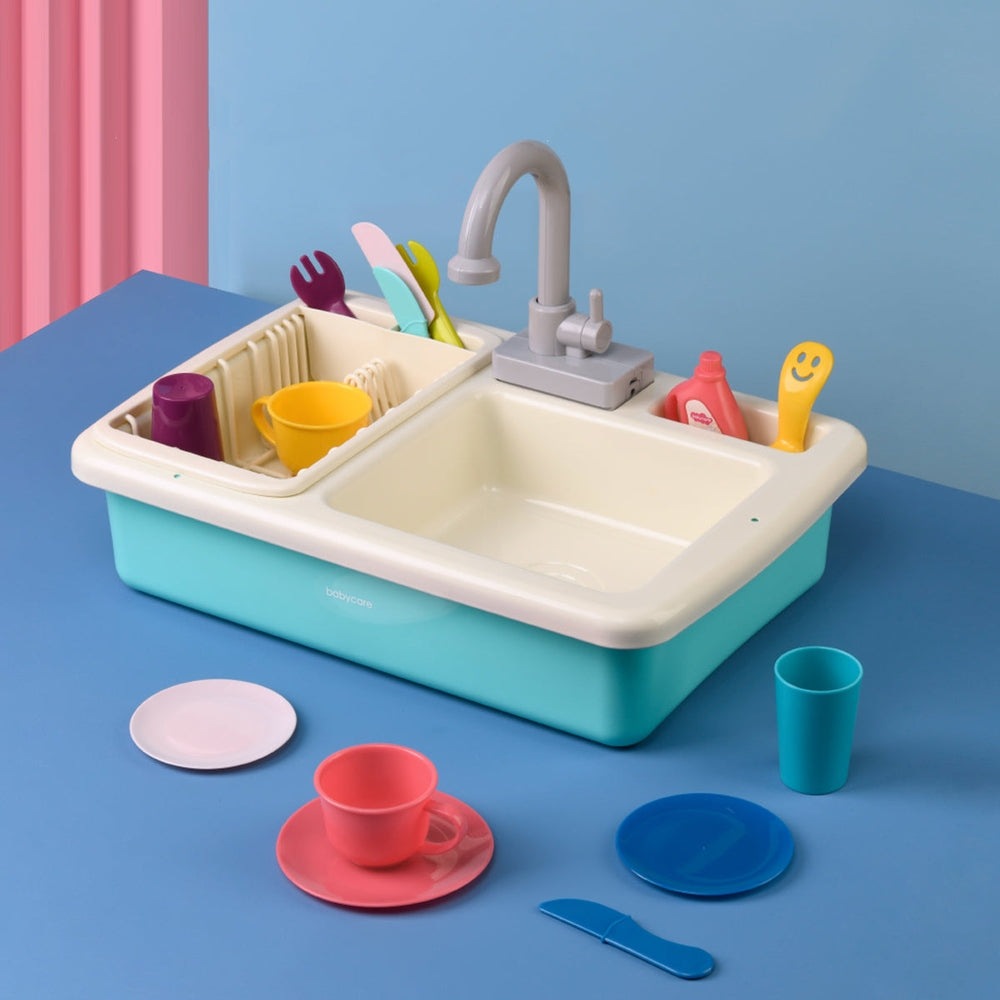 BC Babycare kitchen toy set with turquoise base sink, gray faucet, and colorful dishware for pretend play