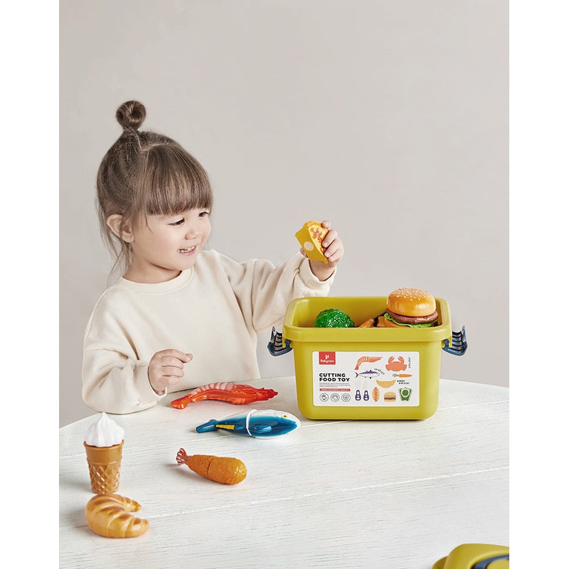 BC Babycare Little Cooker Toy Set with 39-piece plastic foods in a yellow storage tub