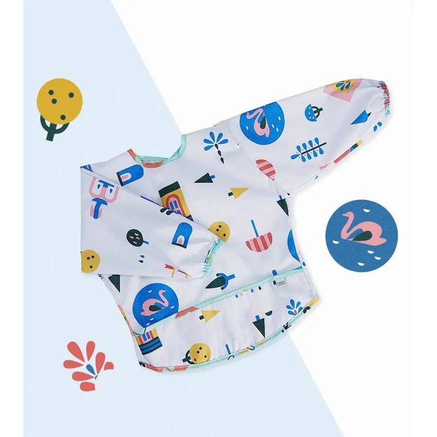 BC Babycare Long Sleeve Bib in white with mint trim and playful multicolor shapes laid flat.