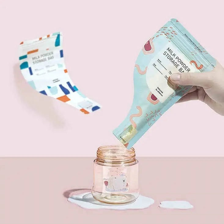 BC Babycare Milk Powder Storage Bag in teal pattern; two bags shown as powder is poured into a jar.