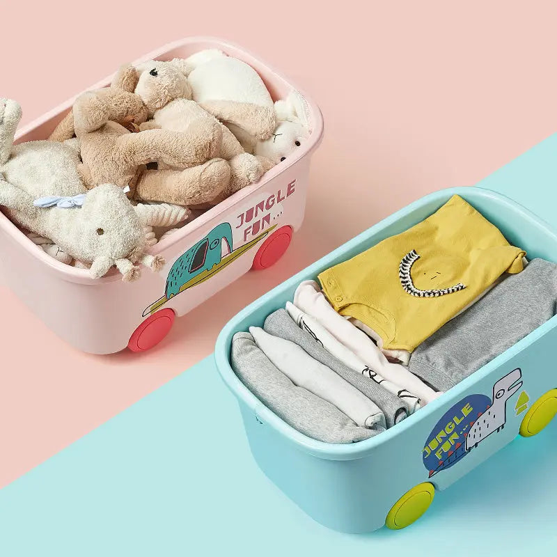 BC Babycare Toy Storage Box set, pink box full of plush toys and blue box with folded clothes; wheels on each.