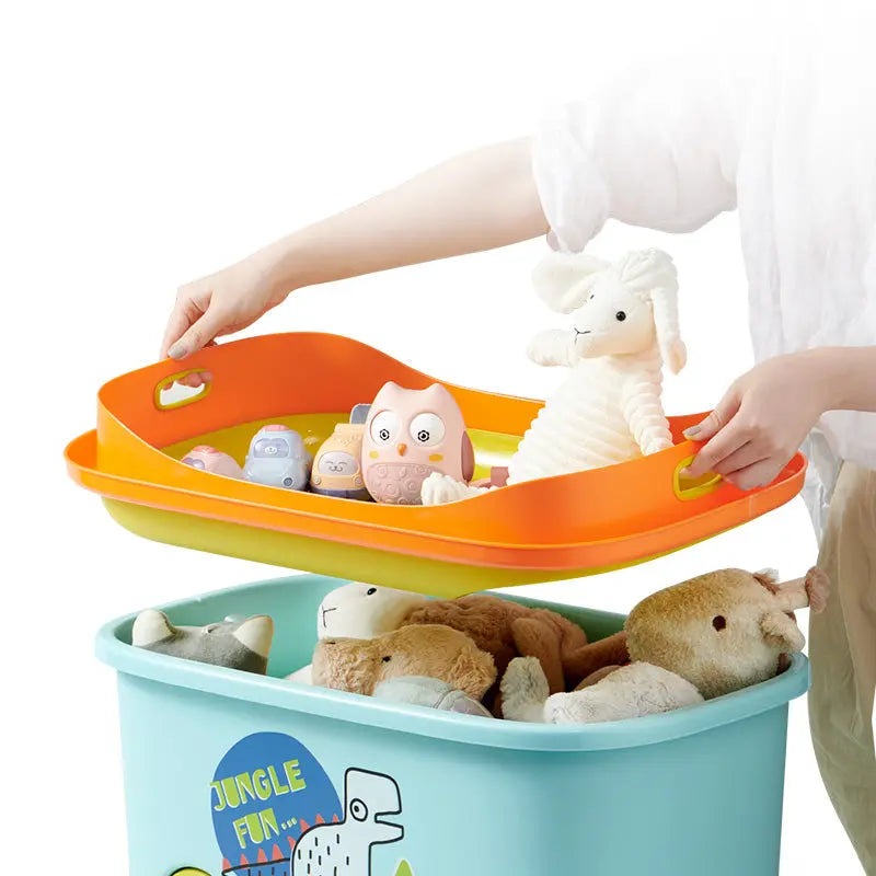 BC Babycare Toy Storage Box with orange lid and teal tub; a person lifts the lid to reveal plush and plastic toys.