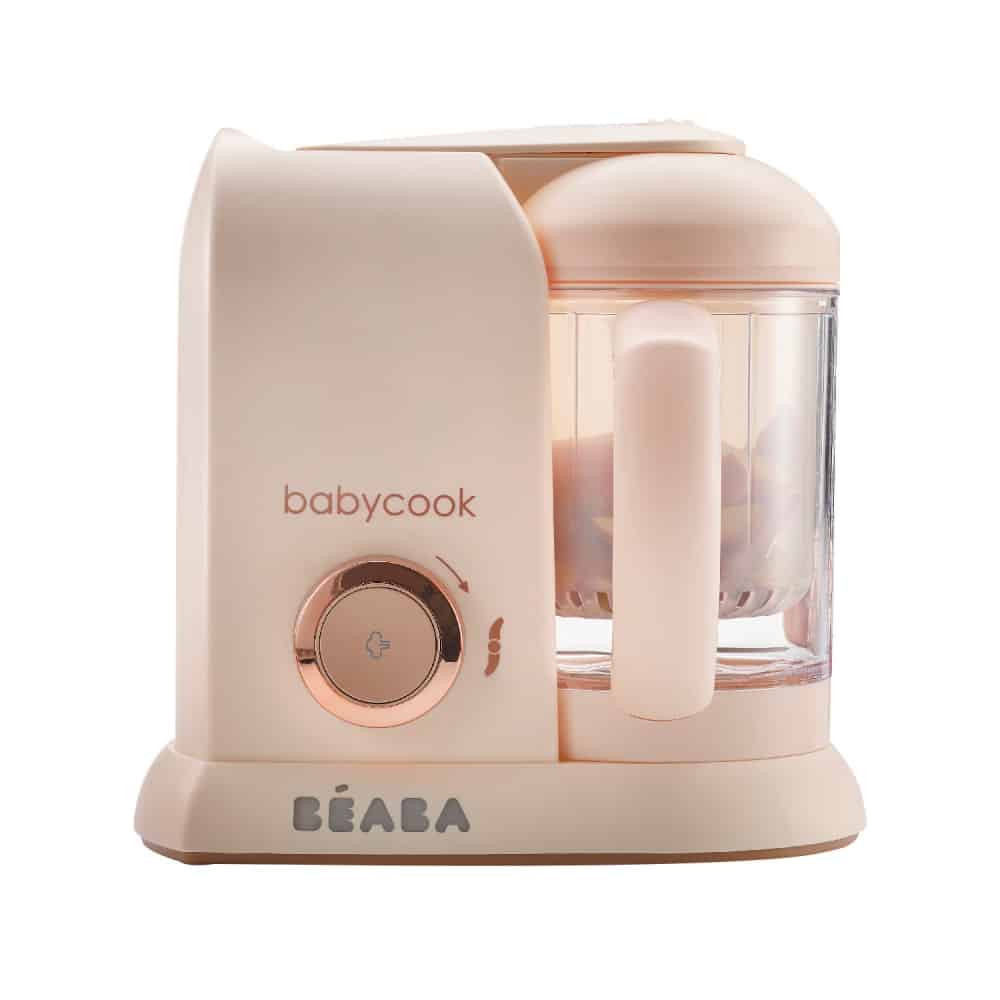 Beaba Babycook Solo baby food maker in rose gold with removable jar and dial control.