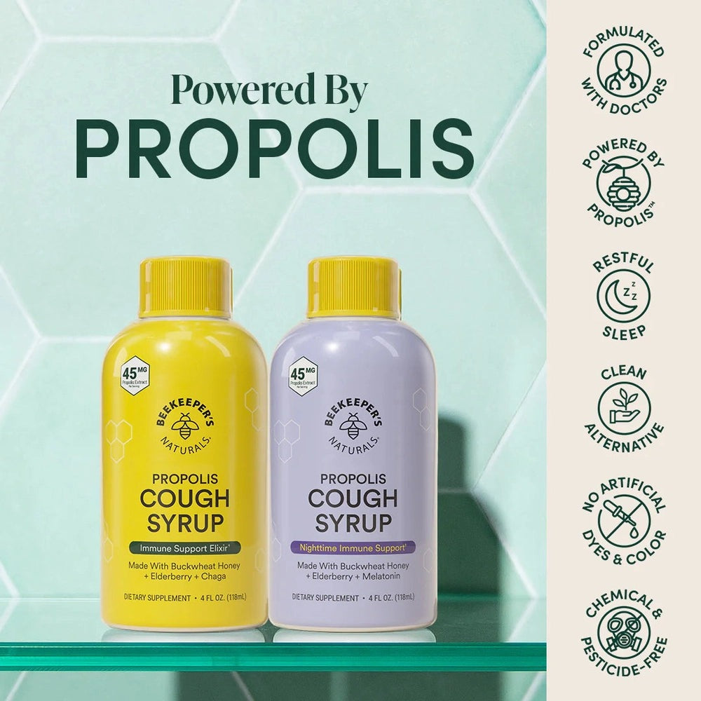 Beekeeper's Naturals Propolis Cough Syrup Nighttime 118 ml, yellow and lavender bottles on a glass shelf signaling immune support.