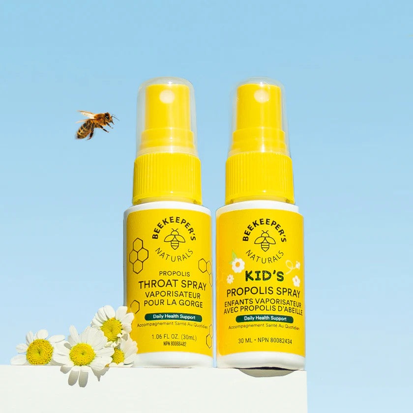 Beekeeper's Naturals Propolis Honey Throat Spray for Kids, 30 ml; two yellow spray bottles with bee logos