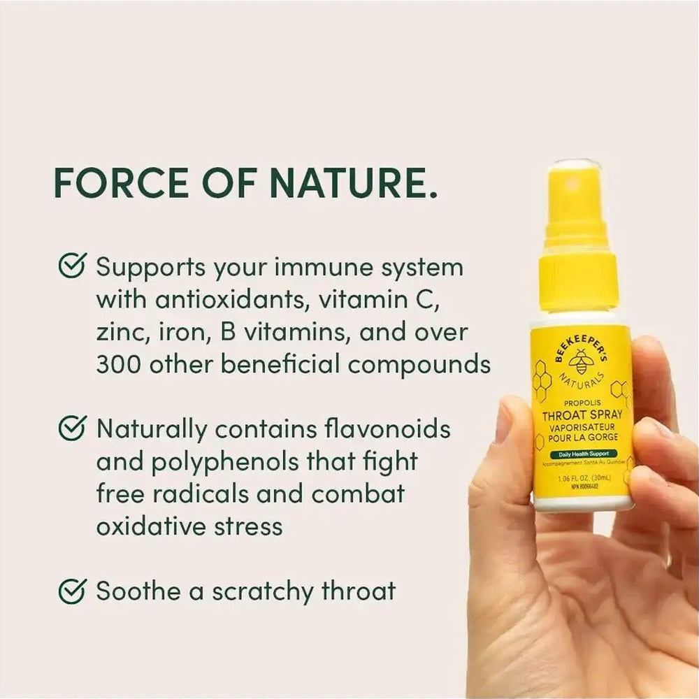Beekeeper's Naturals Propolis Throat Spray 30 ml held in hand beside a beige ad promoting immune support.