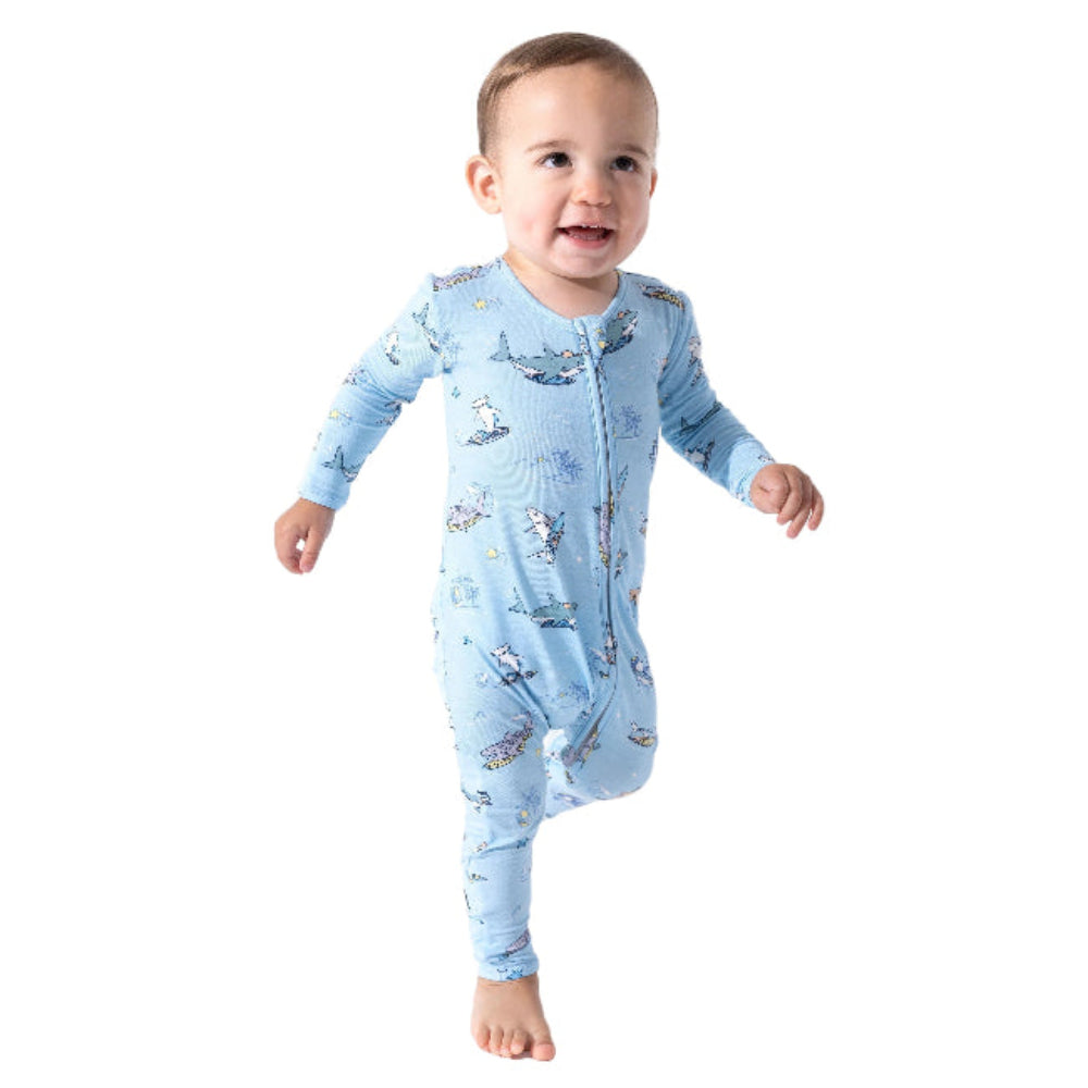 Bellabu Bear Bamboo Convertible Footie Shark School sleeper in light blue with shark print; toddler walking.