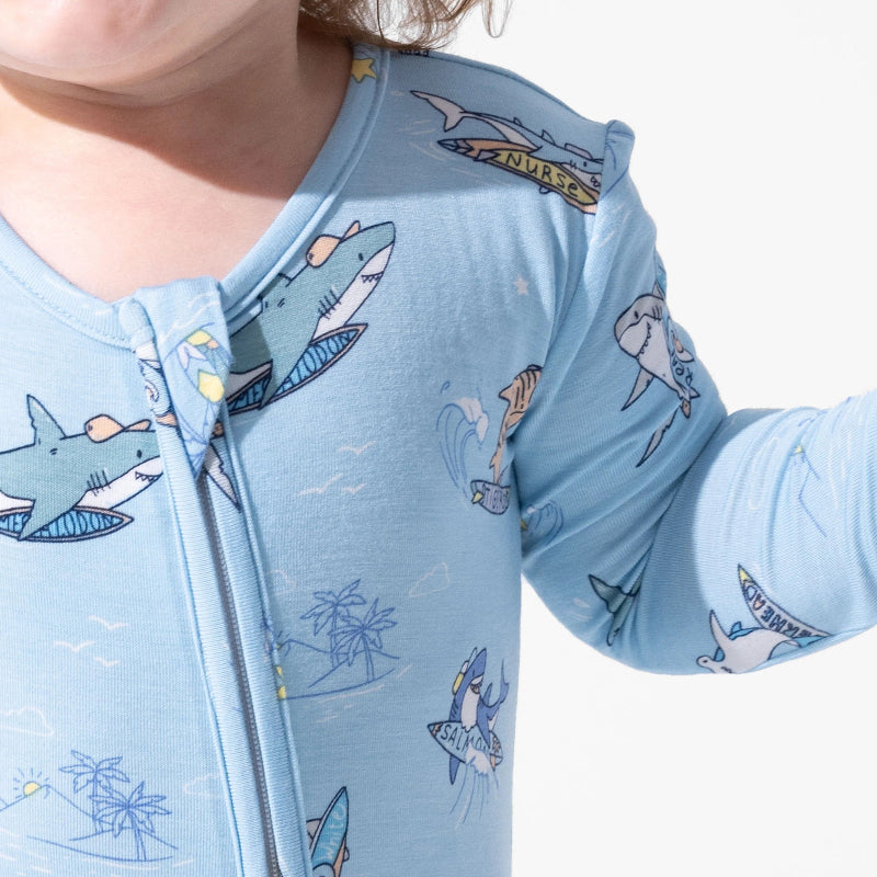 Bellabu Bear Bamboo Convertible Footie Shark School in light blue; baby wears the shark-print one-piece.