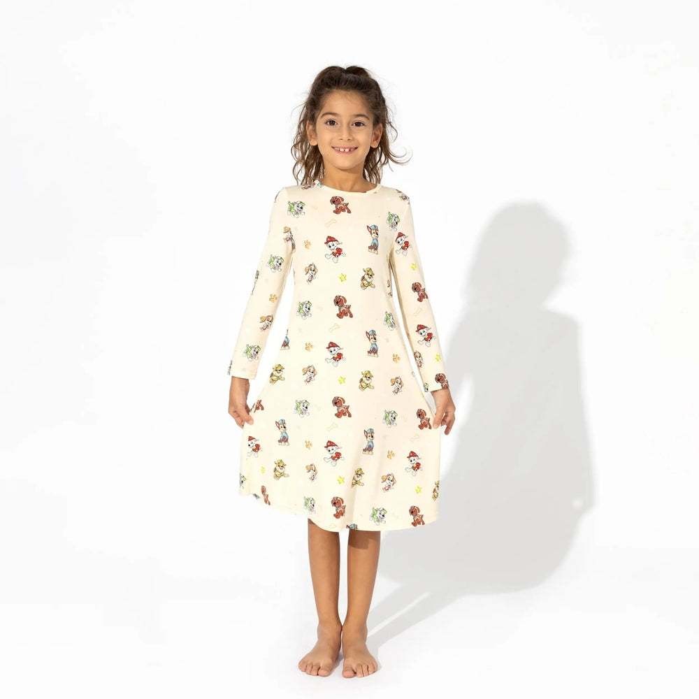 Bellabu Bear Bamboo Girls' Long Sleeve Dress Paw Patrol in cream; girl wears it, smiling, showing soft fabric.