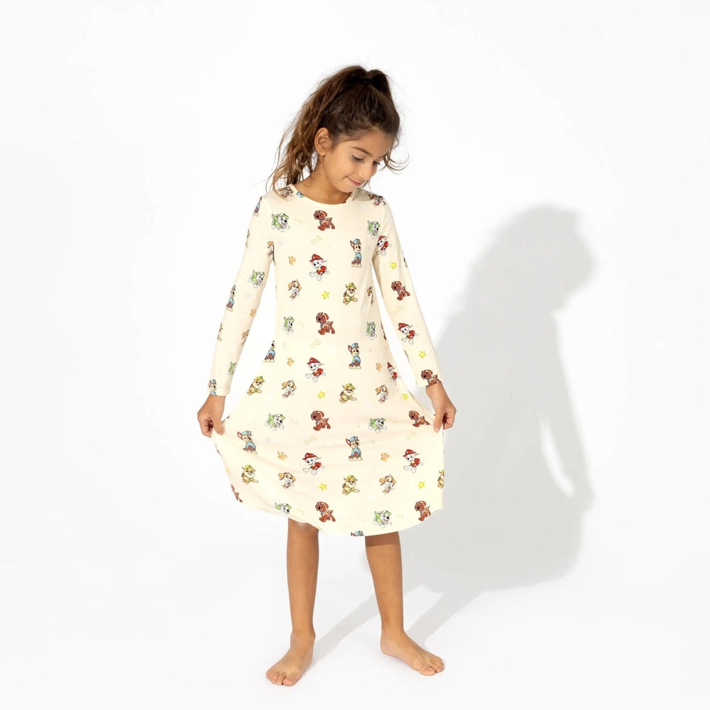 Bellabu Bear Bamboo Girls' Long Sleeve Dress Paw Patrol worn by a girl, showcasing colorful Paw Patrol print.